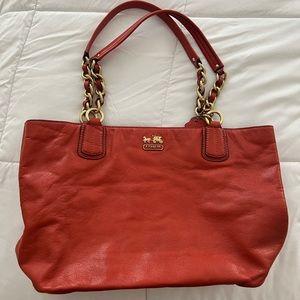 Burnt orange Coach purse